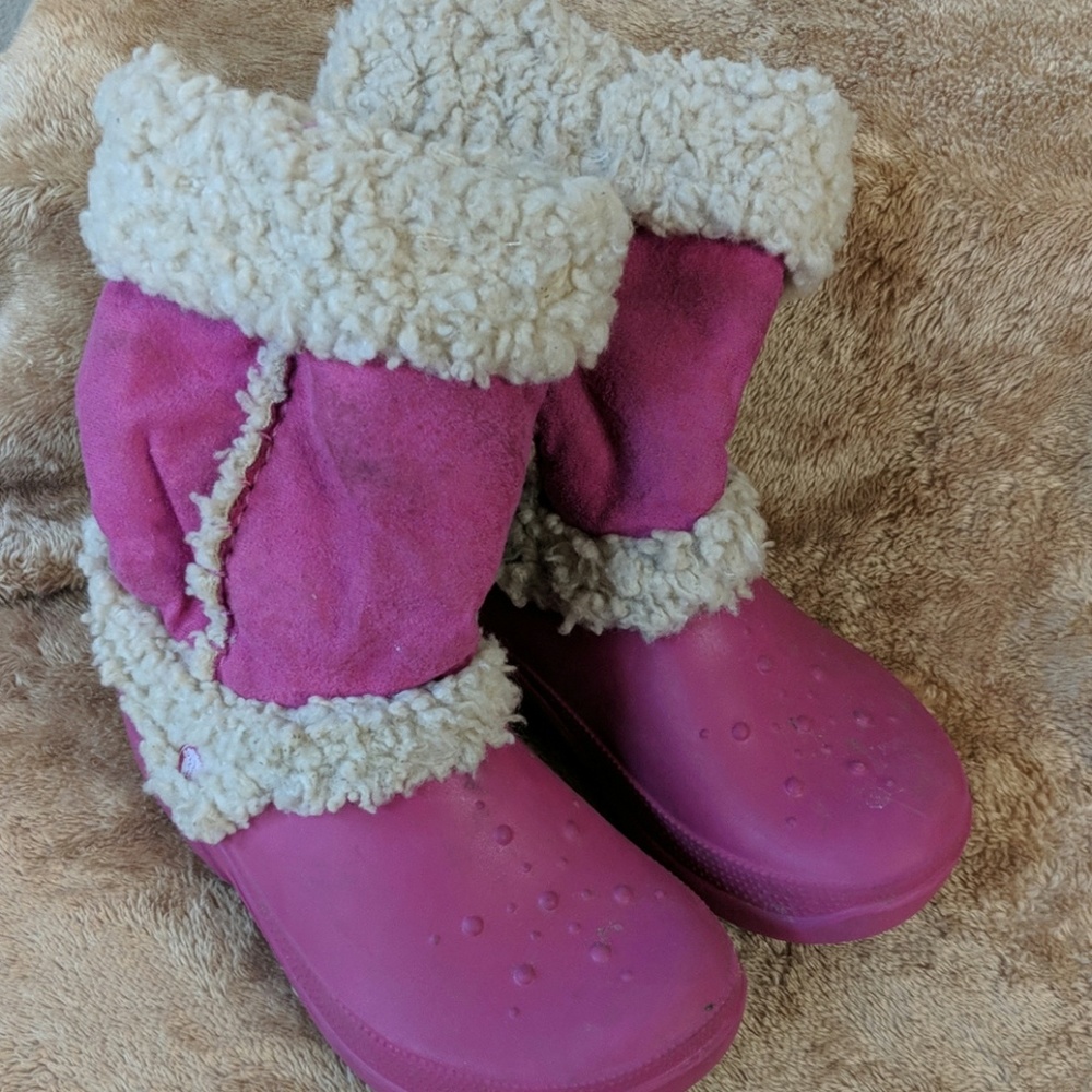 Used hot pink Crocs size 2